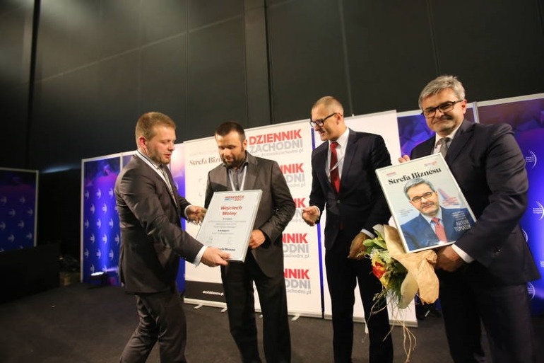 Wojciech Wolny odbiera nagrodę