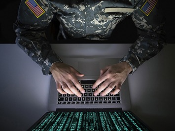 soldier using a computer