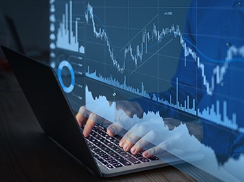 hands of person using a laptop